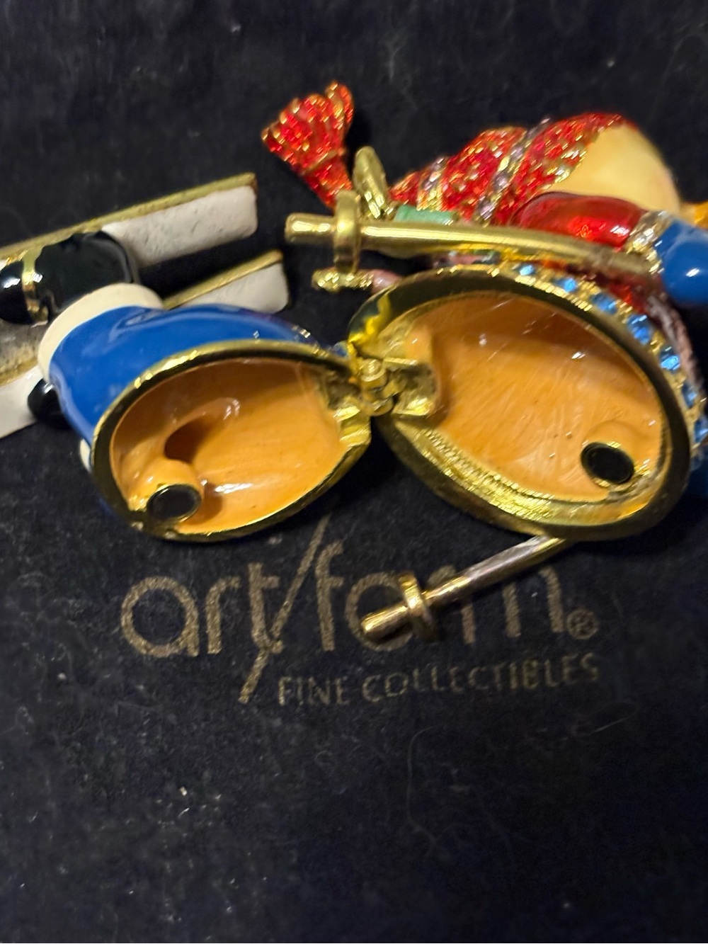 Enamel Skiing snowman trinket box opens
